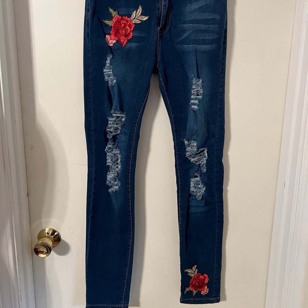 Women’s rose embroidered jeans